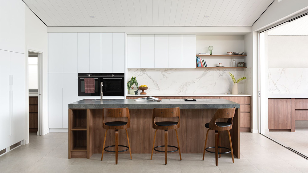 large kitchen renovation with marble splash backs